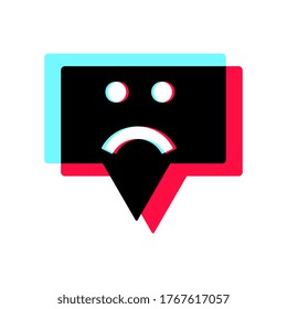 Comment icon or message with a sad emoticon. Colors of popular social network, flat design