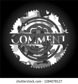 Comment written on a grey camouflage texture
