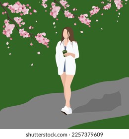Commercial vector flat illustration of a young beautiful girl in fashionable clothes walking in a spring blooming park with a glass of coffee in her hand
