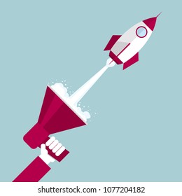 Communication concept,Hand holding megaphone, Rocket launch from megaphone.