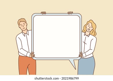 Communication and speech sign concept. Young smiling Businessman and woman standing holding white mockup speech bubble in hands vector illustration 