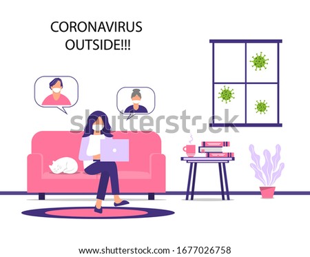 Communication through social networks without leaving your home during an outbreak of the COVID-19 virus. The girl communicates with relatives via the Internet. Prevention of the spread of the virus.