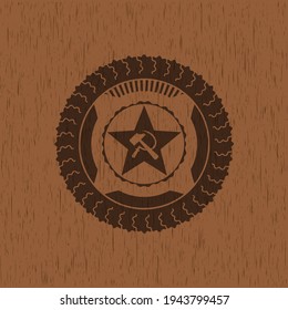 communism icon inside badge with wood background. 
