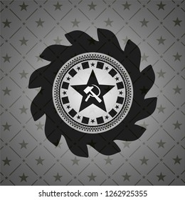 communism icon inside black badge