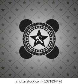 communism icon inside black emblem