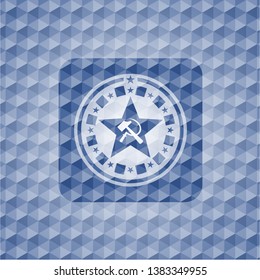 communism icon inside blue badge with geometric pattern background.