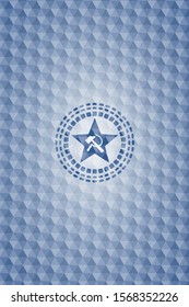 communism icon inside blue badge with geometric background.
