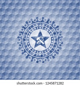 communism icon inside blue emblem with geometric background.