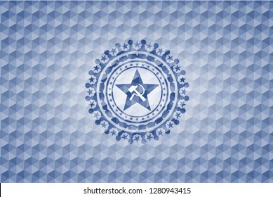 communism icon inside blue emblem with geometric pattern.