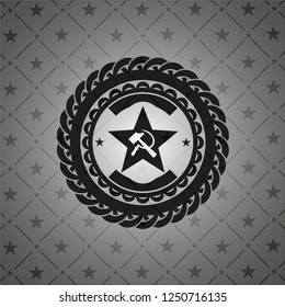 communism icon inside dark badge or emblem