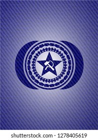 communism icon inside emblem with jean background
