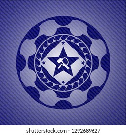 communism icon inside emblem with jean background