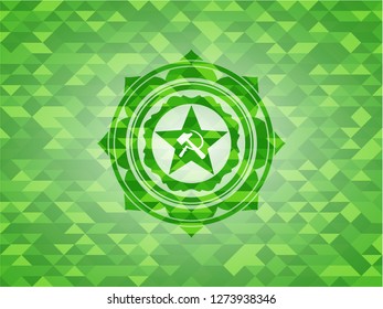 communism icon inside green emblem with mosaic background