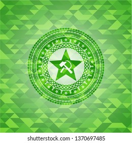 communism icon inside green emblem. Mosaic background