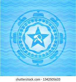 communism icon inside light blue water emblem.