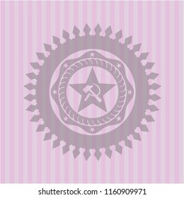 communism icon inside pink emblem