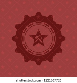communism icon inside red emblem