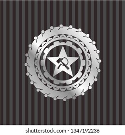 communism icon inside silver emblem or badge