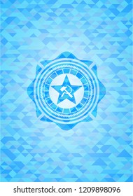 communism icon inside sky blue emblem with mosaic background