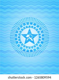 communism icon inside water wave concept badge.