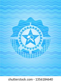 communism icon inside water wave representation style badge.