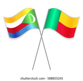 Comoran and Beninese crossed flags. Comoros combined with Benin isolated on white. Language learning, international business or travel concept.