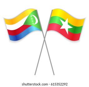 Comoran and Burmese crossed flags. Comoros combined with Burma isolated on white. Language learning, international business or travel concept.