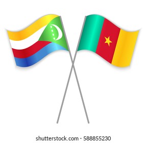Comoran and Cameroonian crossed flags. Comoros combined with Cameroon isolated on white. Language learning, international business or travel concept.