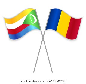 Comoran and Chadian crossed flags. Comoros combined with Chad isolated on white. Language learning, international business or travel concept.