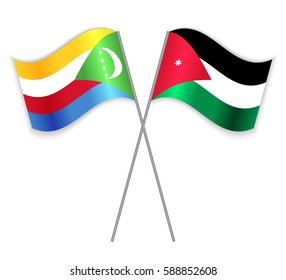 Comoran and Jordanian crossed flags. Comoros combined with Jordan isolated on white. Language learning, international business or travel concept.