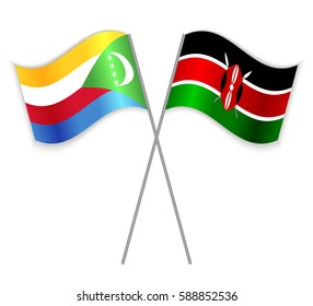 Comoran and Kenyan crossed flags. Comoros combined with Kenya isolated on white. Language learning, international business or travel concept.