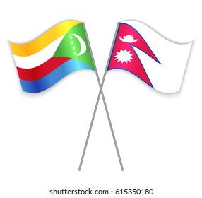 Comoran and Nepalese crossed flags. Comoros combined with Nepal isolated on white. Language learning, international business or travel concept.