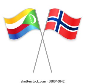 Comoran and Norwegian crossed flags. Comoros combined with Norway isolated on white. Language learning, international business or travel concept.