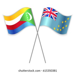 Comoran and Tuvaluan crossed flags. Comoros combined with Tuvalu isolated on white. Language learning, international business or travel concept.