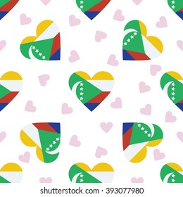 Comoros independence day seamless pattern. Patriotic country flag background. Comoros flag in the shape of heart. Vector seamless pattern.