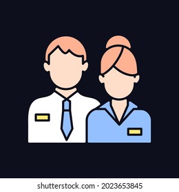 Company staff RGB color icon for dark theme. Man and woman in uniform. Official business representatives. Isolated vector illustration on night mode background. Simple filled line drawing on black