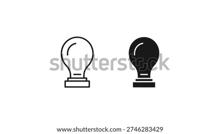 Comparison of lit and unlit traditional light bulbs on stands