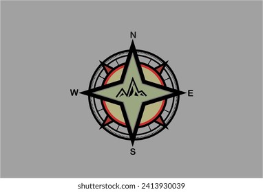 compass with the addition of a mountain design in the middle