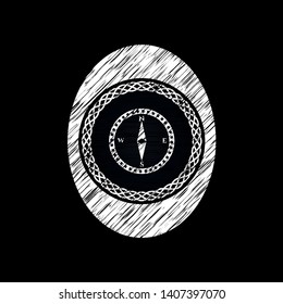 compass icon drawn with chalkboard texture