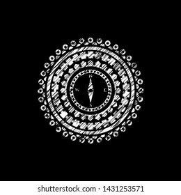 compass icon drawn on blackboard