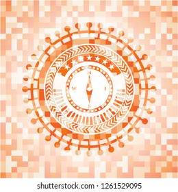 compass icon inside abstract orange mosaic emblem