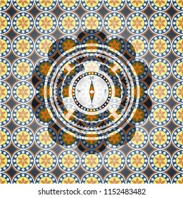 compass icon inside arabesque style badge. arabic decoration.