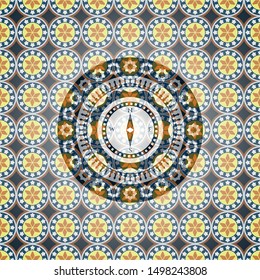 compass icon inside arabic badge. Arabesque decoration.