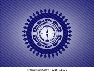 compass icon inside badge with jean texture
