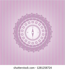 compass icon inside badge with pink background
