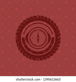 compass icon inside badge with red background