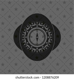compass icon inside black badge