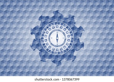 compass icon inside blue badge with geometric pattern background.