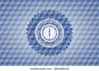 icono de brújula dentro de la placa azul con un patrón geométrico. 