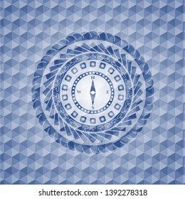 compass icon inside blue hexagon emblem.